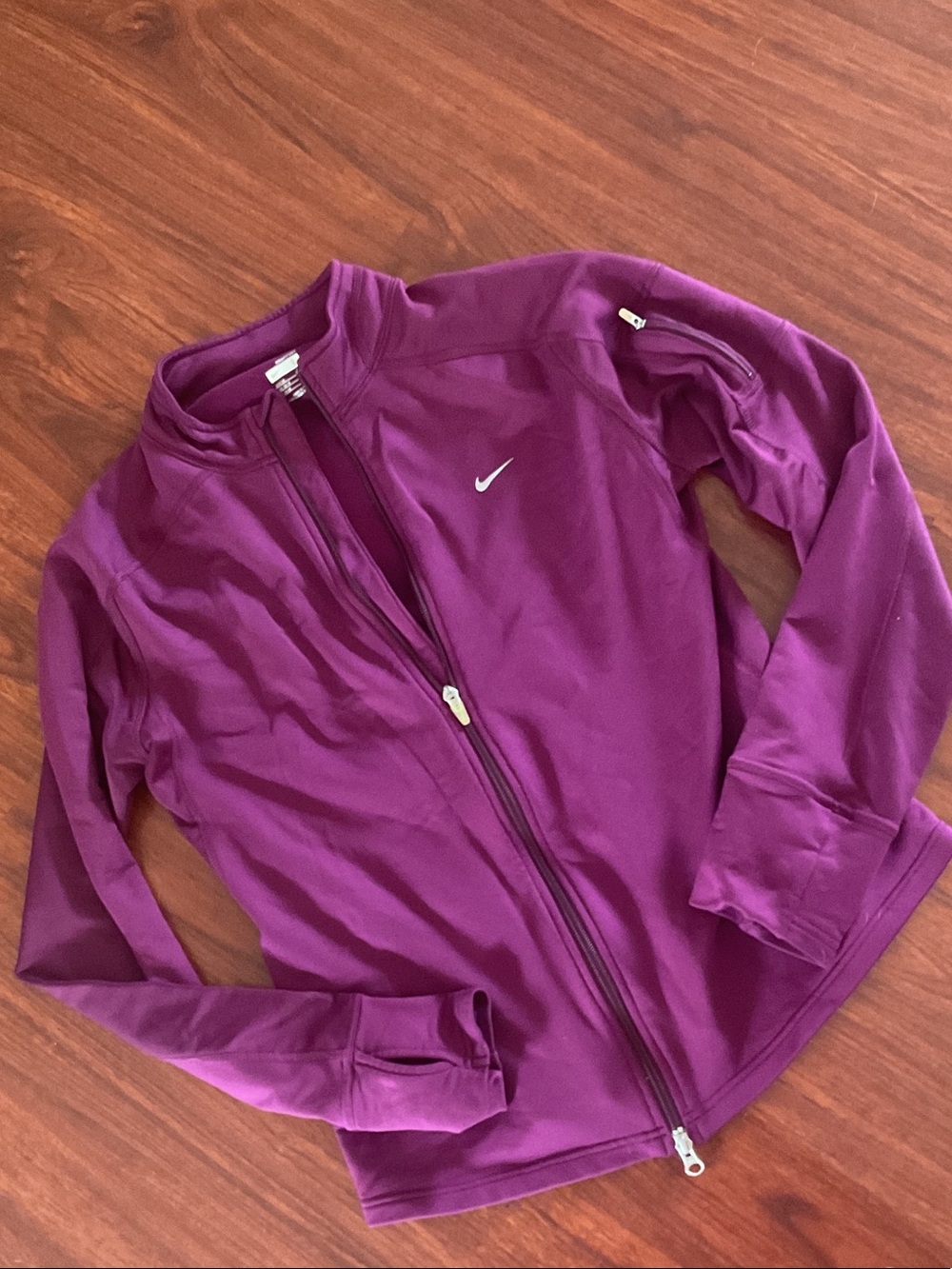 Nike Purple Zip-Up Performance Jacket with arm pocket and thumb holes